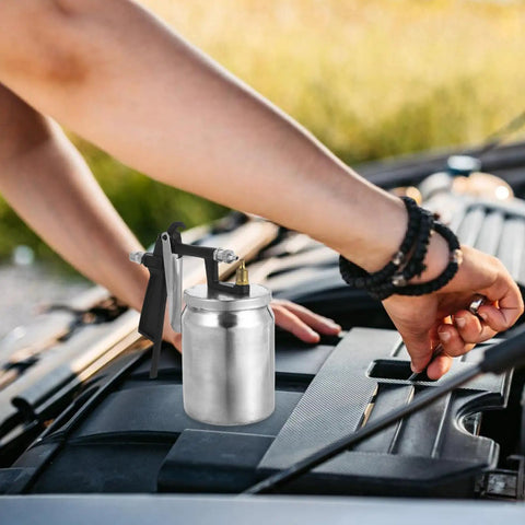 Real Deal Pneumatic Paint Sprayer With Tough Metal Housing For Slick Furniture Finishing And Car Refinishing on car engine.