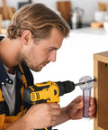 Slick Drill Dust Cover Attachment For Saws And Drill Bits With No Sweat Debris Capture System in use on a drill bit.
