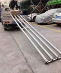 Foldable 4 Row Gravity Roller Conveyor With Abs Plastic Wheels And Stainless Steel Frame Portable Unloading Pulley Slide Channel in use with package.