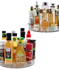 Two Pack 11 Inch Lazy Susan Organizer With Non Slip Turntable For Cabinet Fridge Kitchen Pantry Under Sink Vanity And More filled with sauces and perfumes