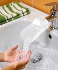 Universal Faucet Extender For Bathroom Sink And Kitchen Tap With Soft Spray Aerated Nozzle And Anti Splash Guard Easy Peasy Setup Durable Chrome Trim, water flowing into hands.