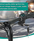 E Bike Voltage Display With LCD Readout Thumb Throttle Real Time Digital Battery Voltage Power Switch With Key Lock For E Scooter And Electric Bicycle No Battery Drama Works With Lead Acid Or Lithium showing handlebars and display on bicycle