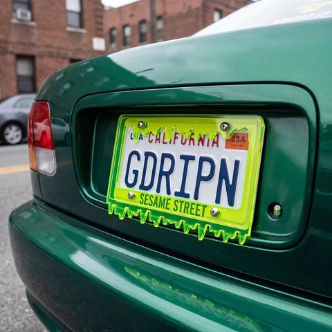 Glow In The Dark Dope Fluorescent Green Acrylic License Plate Frame With Screws Fits Standard 6x12 Inch Car Plates on dark green car