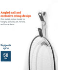 Heavy Duty Picture Hooks For Walls With 50 Lb Capacity Durable Drywall Hangers And Nails Includes 1000 Hooks And 100 Nails For Secure Frame Hanging Great For Large Art Clocks And Gallery Displays showing close-up on angled nail design with wire.