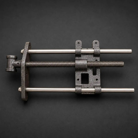 Heavy Duty Carpentry Bench Vise With Manual Threaded Screw For Tightening Workpieces During DIY Cutting Or Sanding And Assembly Projects In Your Workshop top view of steel structure