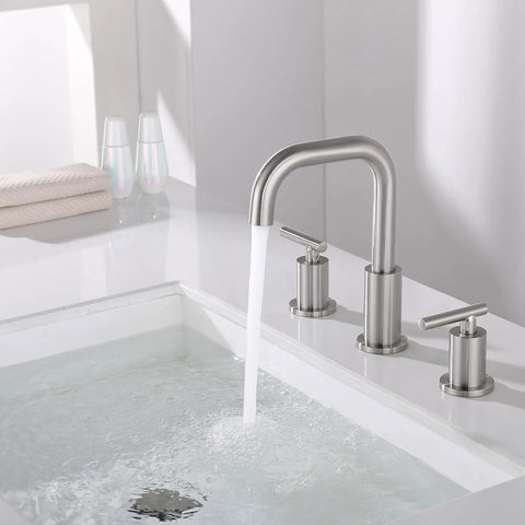 8 Inch Brushed Nickel Widespread Bathroom Faucet With Two Handles, 3 Hole Mount, SpotShield Finish mounted on white sink