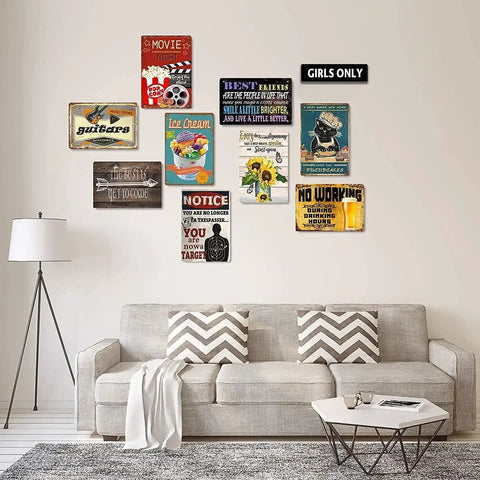 Living room with various metal tin signs on wall, including cheat sheet chart poster metal tin sign for garage workshop, 8x12 inch.