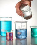 Set Of Four 600 mL Borosilicate Glass Beakers For Lab Classrooms And Research with pouring liquid demonstration