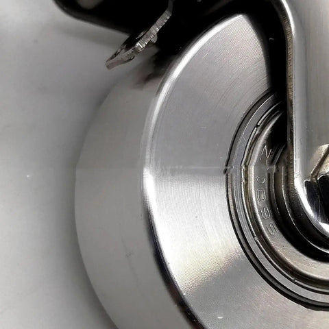Close-up of Four Pack Industrial Plate Caster Wheels Heavy Duty Steel Castors Non Swivel With Rust Proof 304 Stainless Steel Housing
