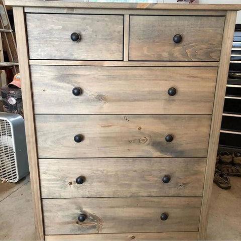 Legit Rusted Aging Wood Stain Delivers Hella Authentic Weathered Brown And Gray Patina for a wood dresser with black knobs.