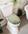 Round Peacock White Heron Blooming Garden Cherry Blossoms Toilet Seat on a white toilet in a floral bathroom setting.