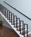 Matte Black Industrial Pipe Stair Handrail Crafted For Indoor And Outdoor Use Featuring A Super Heavy Duty Galvanized Steel Build on staircase.