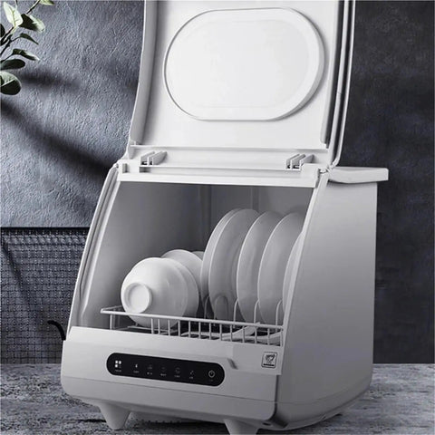 Beat The Dirty Dish Rut With This Slick Portable Dishwasher, Smart Mini Countertop Automatic Model In Stainless Steel, Quick Setup Saves Counter Space And Scrubs Dishes Spotless Every Single Day, open with dishes loaded.