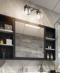 Bathroom with Three Light Matte Black Industrial Vanity Light With Clear Glass Globes, Farmhouse Bathroom Sconce above mirror