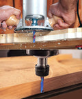 End mill router bit, 1/4 in shank, solid carbide, upcut single-flute for CNC routing
Installed view: router bit cutting wooden board with blue spiral carbide end mill