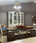 Six-Light Orb Chandelier, 23.62-Inch Rustic Farmhouse Lighting in Stardust Finish above dining table, bronze tone