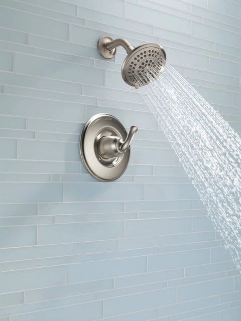 Linden 14 Series Shower Trim Kit With 5 Spray Touch Clean Shower Head in Venetian Bronze installed on tiled wall