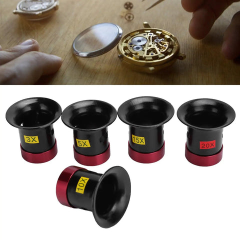 Watchmakers Loupe Set With 3X 5X 10X 15X And 20X Magnifiers Aluminum Alloy Construction next to open watch movement
