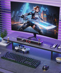Wireless Bluetooth PC Speakers Soundbar For Desktop Laptop Monitor USB Powered Stereo Desktop Speaker System For Computer Tablet Phone Easy Plug And Play Setup GS524 placed under a monitor on a desk setup
