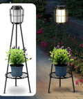 Dope Solar Outdoor Floor Lamp With Plant Stand 2 Pack Waterproof Metal Garden Lights for patio shown with flowers at night