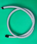 Universal Garment Steamer Hose Extension Set 2m Heat Insulated PVC Tube coiled on green surface