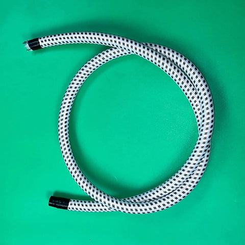 Universal Garment Steamer Hose Extension Set 2m Heat Insulated PVC Tube coiled on green surface
