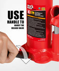 Red Torin Big Red hydraulic bottle jack, 4-ton capacity, side view with hand turning the release-valve lever.