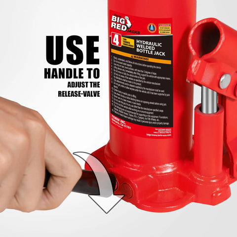 Red Torin Big Red hydraulic bottle jack, 4-ton capacity, side view with hand turning the release-valve lever.