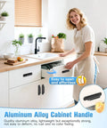 Woman opening kitchen drawer with 5.7 Inch Sliding Barn Door Handle Aluminum Alloy Cabinet Pull For Drawer Closet Shower Glass Shed Kitchen Garage Gate Doors With Screws Black Durable Rust Resistant Ergonomic Grip For Indoor And Outdoor Use.