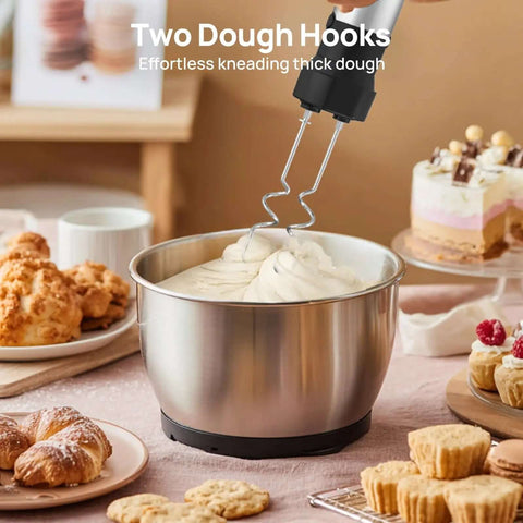4 In 1 Immersion Hand Blender Powered By A Beefy 1100W Motor With Precision Trigger Speed Control And 304 Stainless Steel Shaft mixing thick dough in stainless bowl.