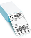 500 Count Fanfold 4x6 Thermal Labels With Perforated Line shown in a stack with a visible shipping barcode