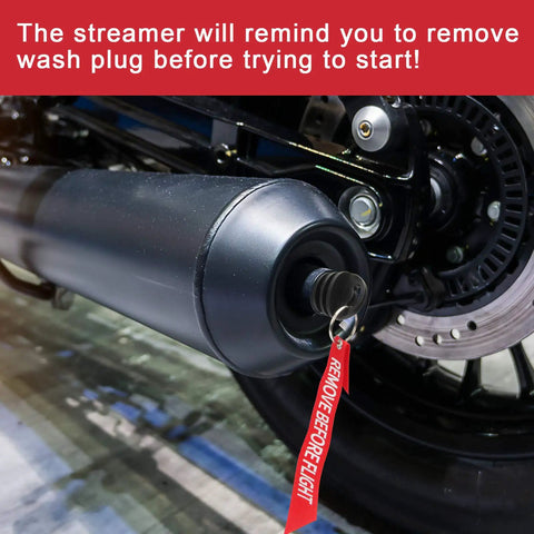 Close-up of exhaust wash plug in motorcycle, labeled 'REMOVE BEFORE FLIGHT'. Exhaust Wash Plug For Motorcycles And Dirt Bikes 0.6 To 1.5 Inch Thick Rubber Fits 2 Stroke Exhaust Ports Keeps Water Dirt And Rodents Out When Washing Or Storing Your Ride Pack Of 2.