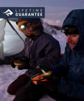 Campers eating with Frontier Ultralight Collapsible Bowl Large 30 Fl Oz Puffins Bill Orange Packable Camping Dish in snow.