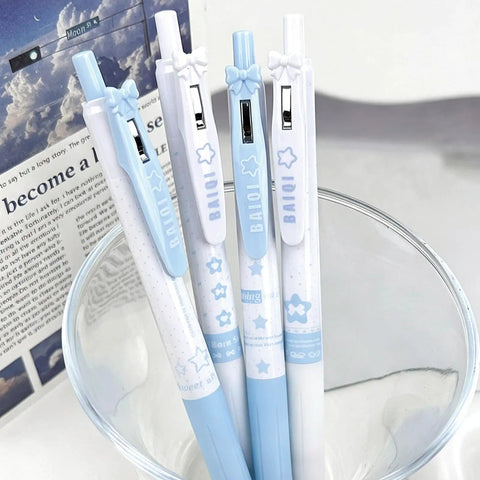 Four Pack Cute Retractable Gel Pens Blue Star 0.5mm Fine Point Black Ink set in a glass, featuring bowknot design.