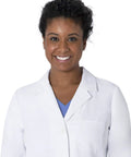 Woman wearing Women's White Lab Coat With Five Pockets Moisture Wicking Two Way Stretch Relaxed Full Length Fit For Doctors And Researchers