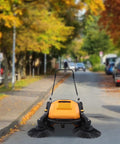 Badass Heavy Duty Walk Behind Push Sweeper With A Wide Forty One Inch Brush And Spacious Dust Bin for outdoor street cleaning.