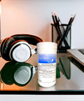 Audio Wipes cleaning towelettes large canister on desk beside headphones and laptop