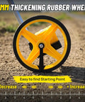 Zozen 6-Inch Measuring Wheel in Feet and Inches, Extended Telescopic Handle showing 13mm thick rubber wheel on ground.