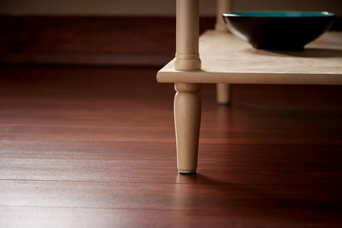 Table leg with pad from Brown 32 Pack Felt Furniture Pads 1 Inch Round Self Stick Protect Hardwood Floors From Dings Dents And Scratches Easy To Apply Quick Install Chair Leg Caps For Tables Lamps And Decor