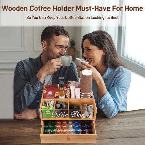 Slick Two Tier Coffee Bar Organizer With Clear Acrylic Window Top And Built In Drawer, Compact Countertop Storage Box For Coffee Pods And Mugs, Dope Kitchen Counter Setup For Your Morning Brew Routine on a wooden table.