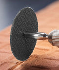 Close-up of resin cutting disc on rotary tool from 115Pcs Cutting Discs Set For Rotary Tool Accessories With HSS Circular Saw Blades Diamond Cutting Wheel Resin Cutting Discs With Mandrels And Screwdrivers Great For Pro DIY Projects And Hobbyists
