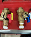 Two Piece Quarter Inch Solid Brass Npt Male Hex Nipple Pipe Fitting Shop Grade Forged Body Rock Tight Seals No Sweat Plumbing And Garage Diy Projects Ready, pair of brass pipe fittings with colored levers.