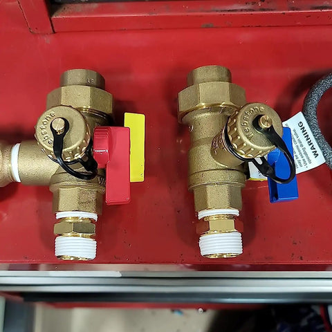 Two Piece Quarter Inch Solid Brass Npt Male Hex Nipple Pipe Fitting Shop Grade Forged Body Rock Tight Seals No Sweat Plumbing And Garage Diy Projects Ready, pair of brass pipe fittings with colored levers.