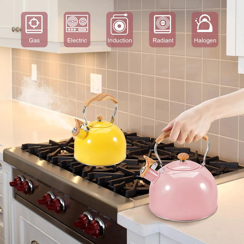 Pink Stainless Steel Tea Kettle For Stove Top 2.6 Qt Whistling Kettle With Wood Pattern Folding Handle And Thumb Control Spout In Use