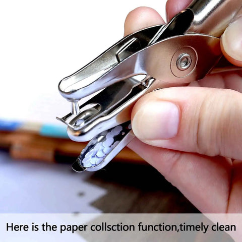 Close-up of easy grip puncher showing waste clip holder, part of Three Pack Metal Hole Punchers With One Eighth Inch Hole For School, Home And Office