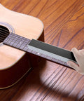 Using 16-inch fret leveling beam from Pro Grade Guitar Luthier Tool Kit With 16 Inch Fret Leveling Beam on acoustic guitar neck.
