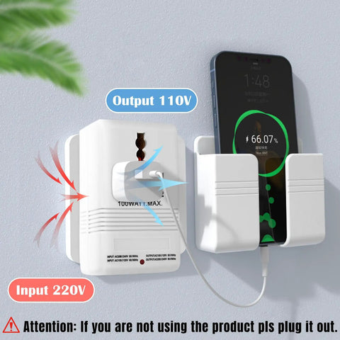 Dual Channel 110V To 220V Step Up And Down Voltage Converter for travel plugged into wall with phone charging.