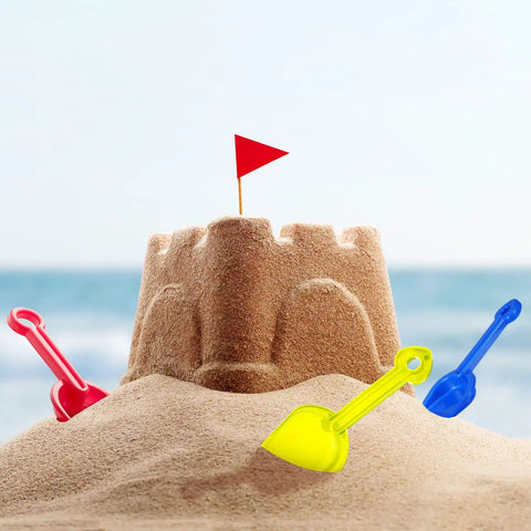 12 Piece Colorful Beach Sand Shovels For Kids Set With Plastic Summer Scoops digging around a sandcastle on a beach