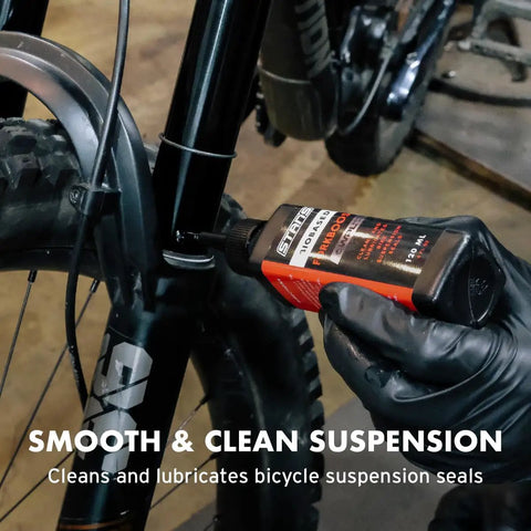 Biobased Fork Suspension Boost for smoother ride and longer seal life, PTFE free, non toxic, biodegradable formula being applied.