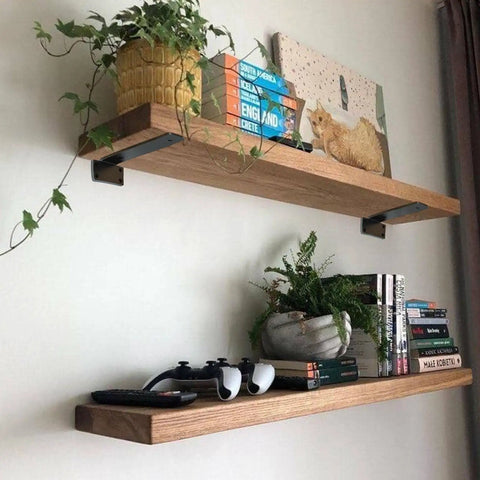 Two wooden shelves supported by Beefy Heavy Duty Floating Shelf Brackets Set 0.2 Inch Thick Industrial Black Steel L Brackets